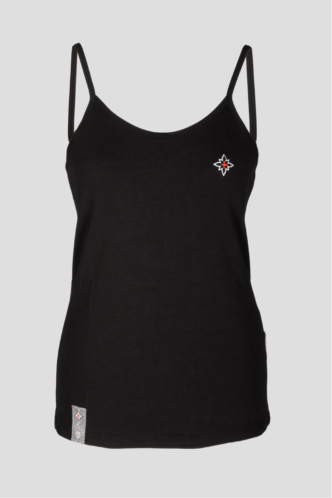Damen Edelweiss Spaghetti-Top von Edelvetica, ein elegantes und sommerliches Kleidungsstück. Dieses Top zeichnet sich durch ein feines Edelweiss-Muster aus und bietet einen leichten und luftigen Tragekomfort. Ideal für warme Tage, kombiniert es schweizerische Tradition mit einem femininen und modernen Stil.