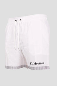 Herren Edelweiss Badehosen von Edelvetica, stilvolle Schwimmbekleidung mit einem markanten Abschluss. Diese Badehosen zeichnen sich durch ein auffälliges Edelweiss-Muster aus, das traditionellen Schweizer Charme in die Strandmode bringt. Ideal für Männer, die Wert auf Stil und Komfort am Strand oder am Pool legen.