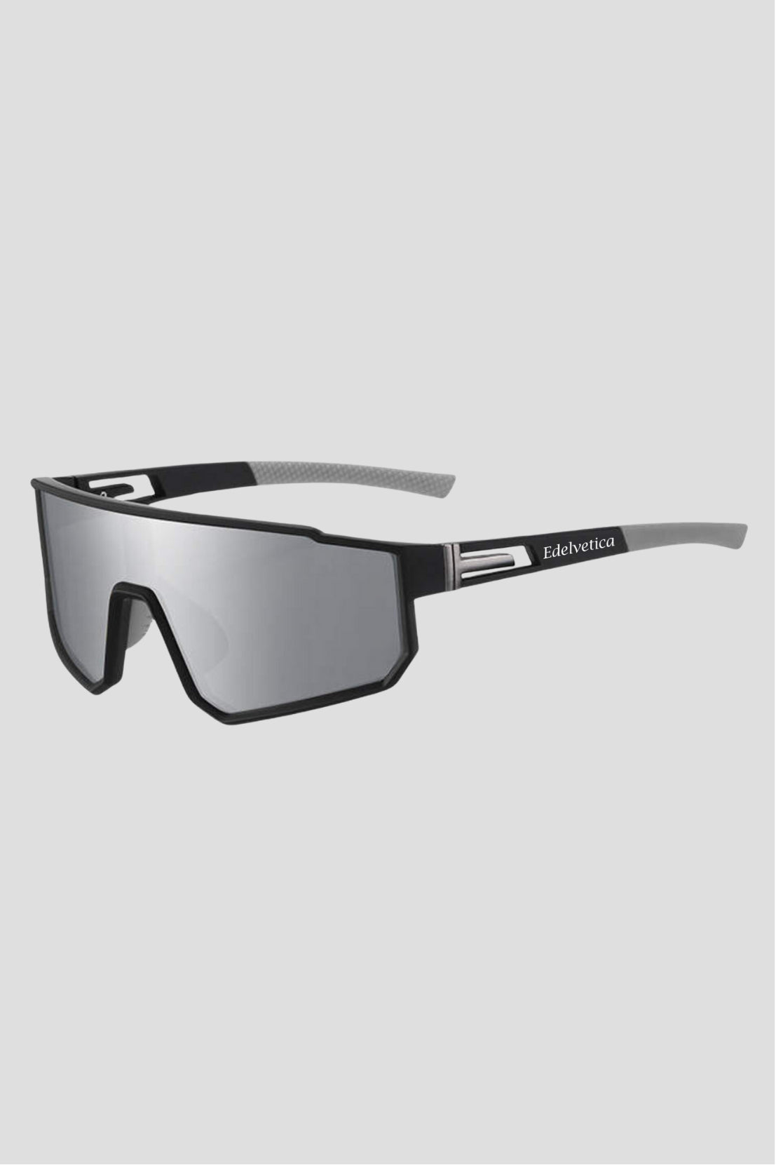 Unisex Sonnenbrille 'Edge' von Edelvetica, eine moderne und stilvolle Sonnenbrille. Sie zeichnet sich durch ihr einzigartiges, kantiges Design aus, das eine trendige und modische Ausstrahlung bietet. Perfekt für Männer und Frauen, die ein Statement-Accessoire suchen, das sowohl Schutz als auch modisches Flair bietet.