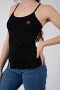 Damen Edelweiss Spaghetti-Top von Edelvetica, ein elegantes und sommerliches Kleidungsstück. Dieses Top zeichnet sich durch ein feines Edelweiss-Muster aus und bietet einen leichten und luftigen Tragekomfort. Ideal für warme Tage, kombiniert es schweizerische Tradition mit einem femininen und modernen Stil.
